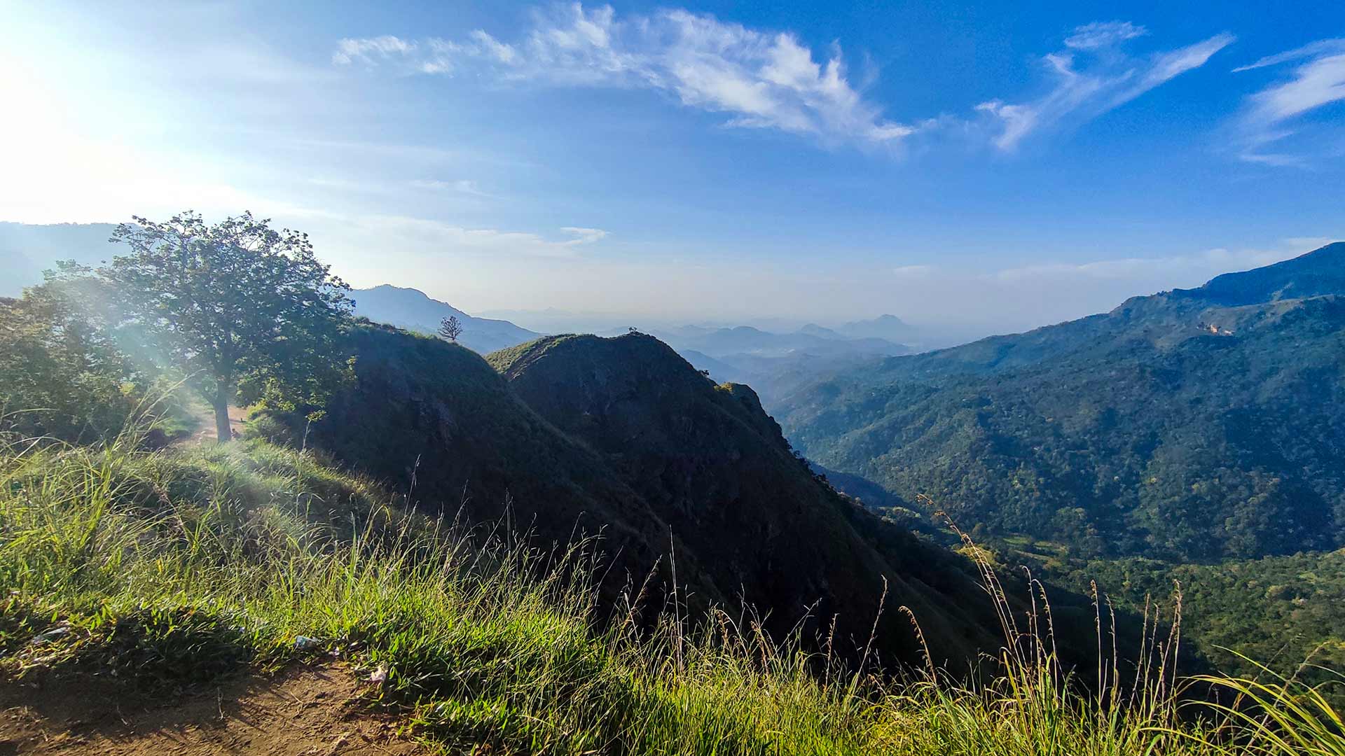Little Adam's Peak summit view overlooking Ella Gap and surrounding hills