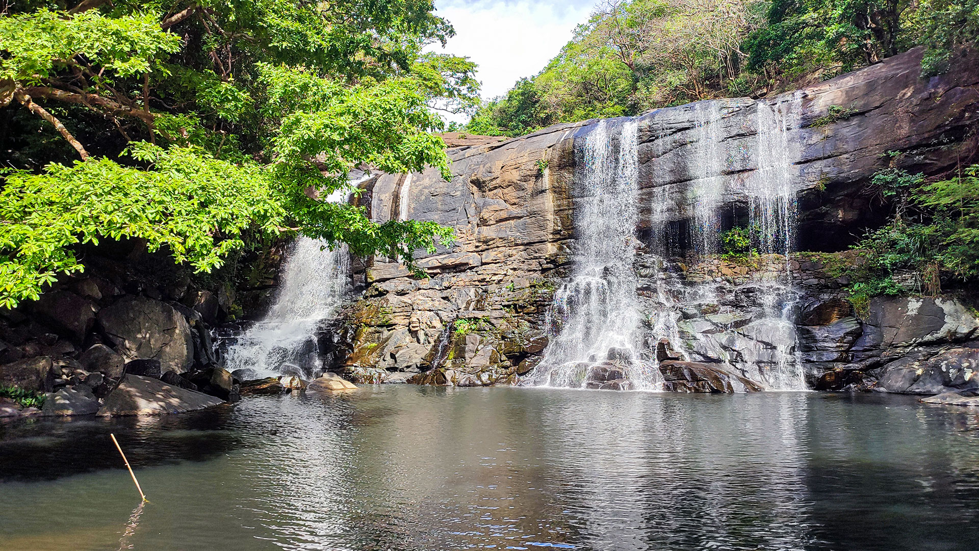 Sera Ella Waterfall split into two cascades in Dumbara Jungle